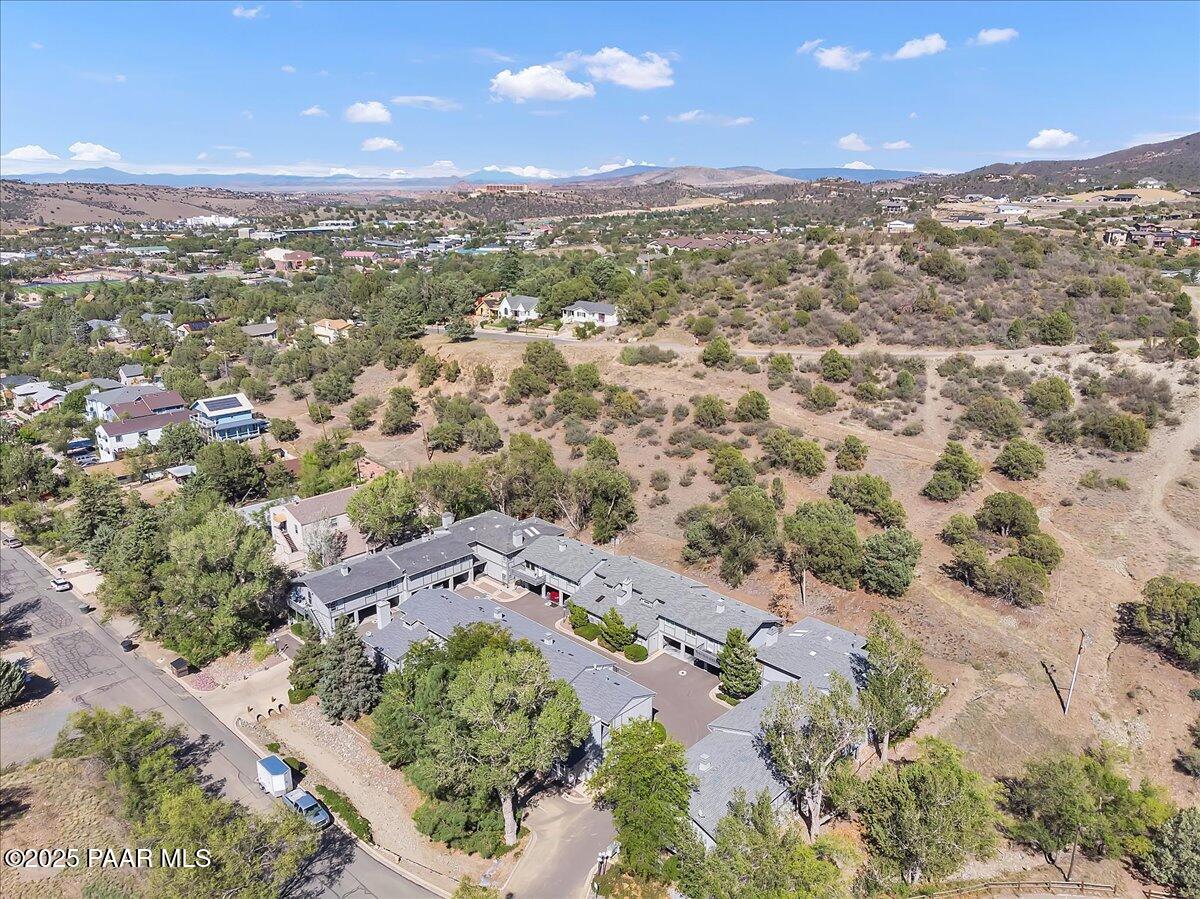 345 South Virginia Street, Unit 9 Prescott, AZ 86303 - Photo 5 of 33 an aerial view of residential houses with outdoor space