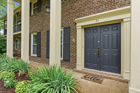 a front view of a house with a garage
