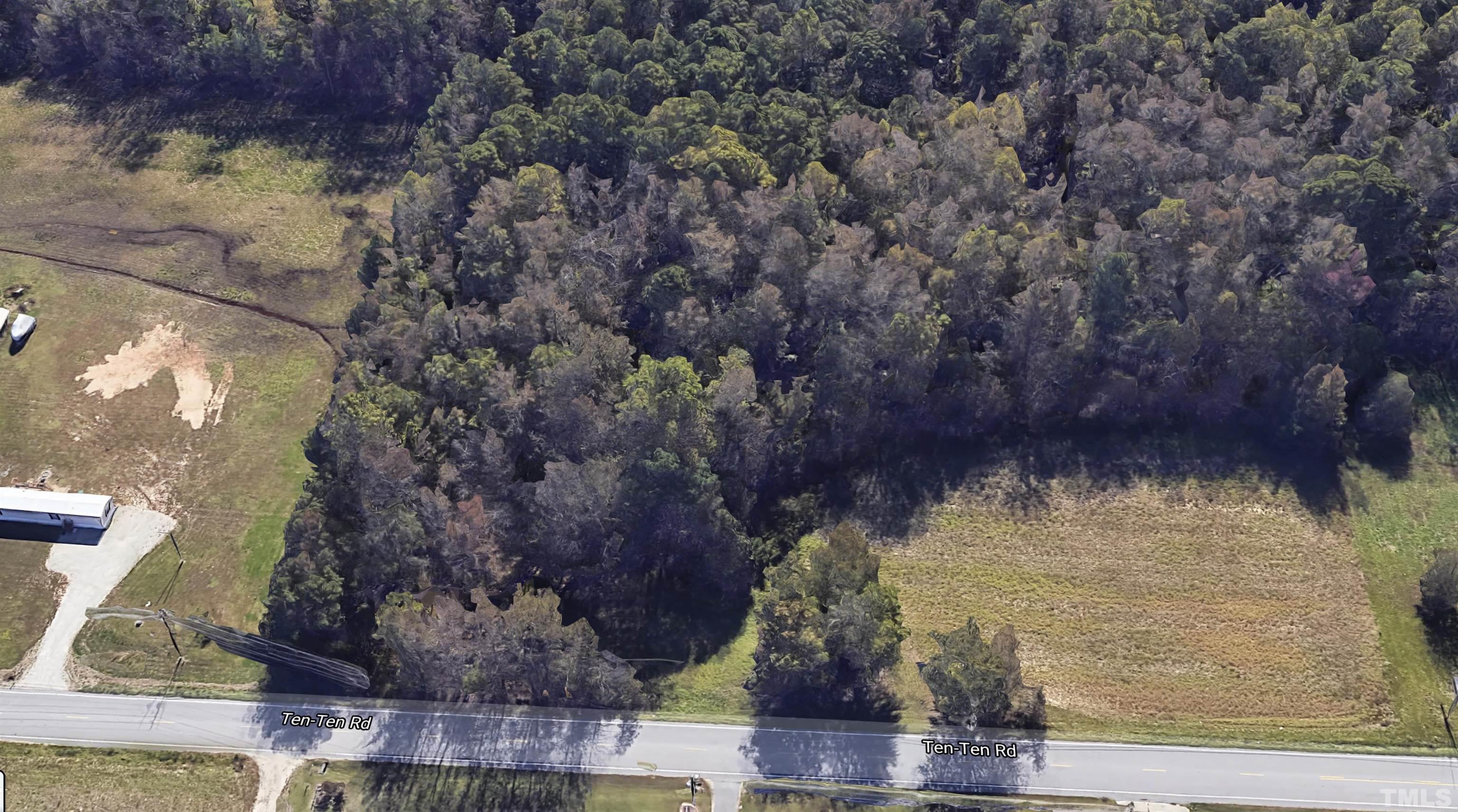 10324 Ten-Ten Road Raleigh, NC 27603 - Photo 2 of 14 a view of lake from next to house