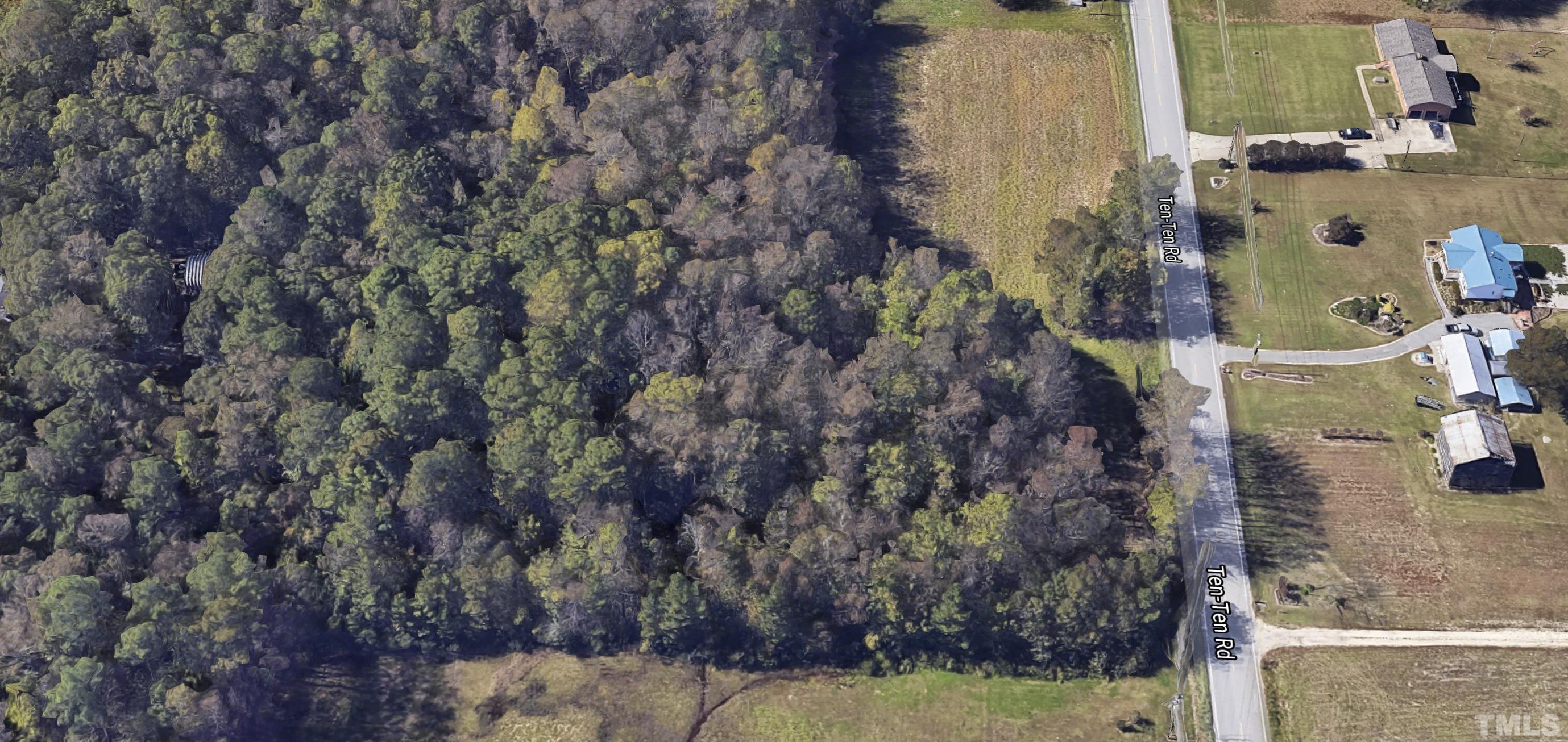 10324 Ten-Ten Road Raleigh, NC 27603 - Photo 3 of 14 a aerial view of a house with a yard