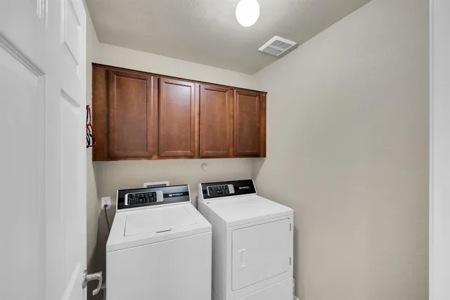 a bathroom with a shower and a toilet