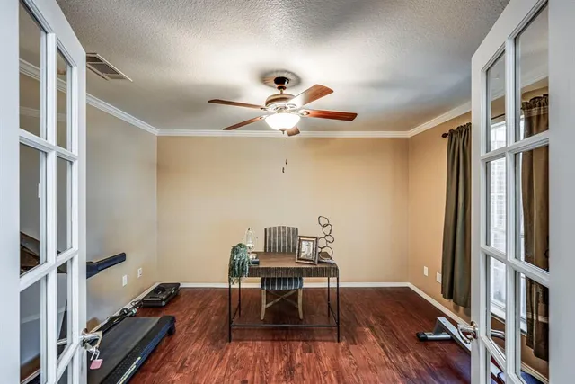 a workspace with furniture and wooden floor