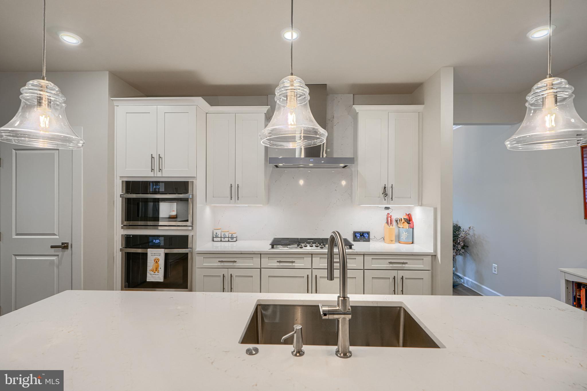 8511 Lallybroch Lane Fulton, MD 20759 - Photo 17 of 78 Quartz island and backsplash