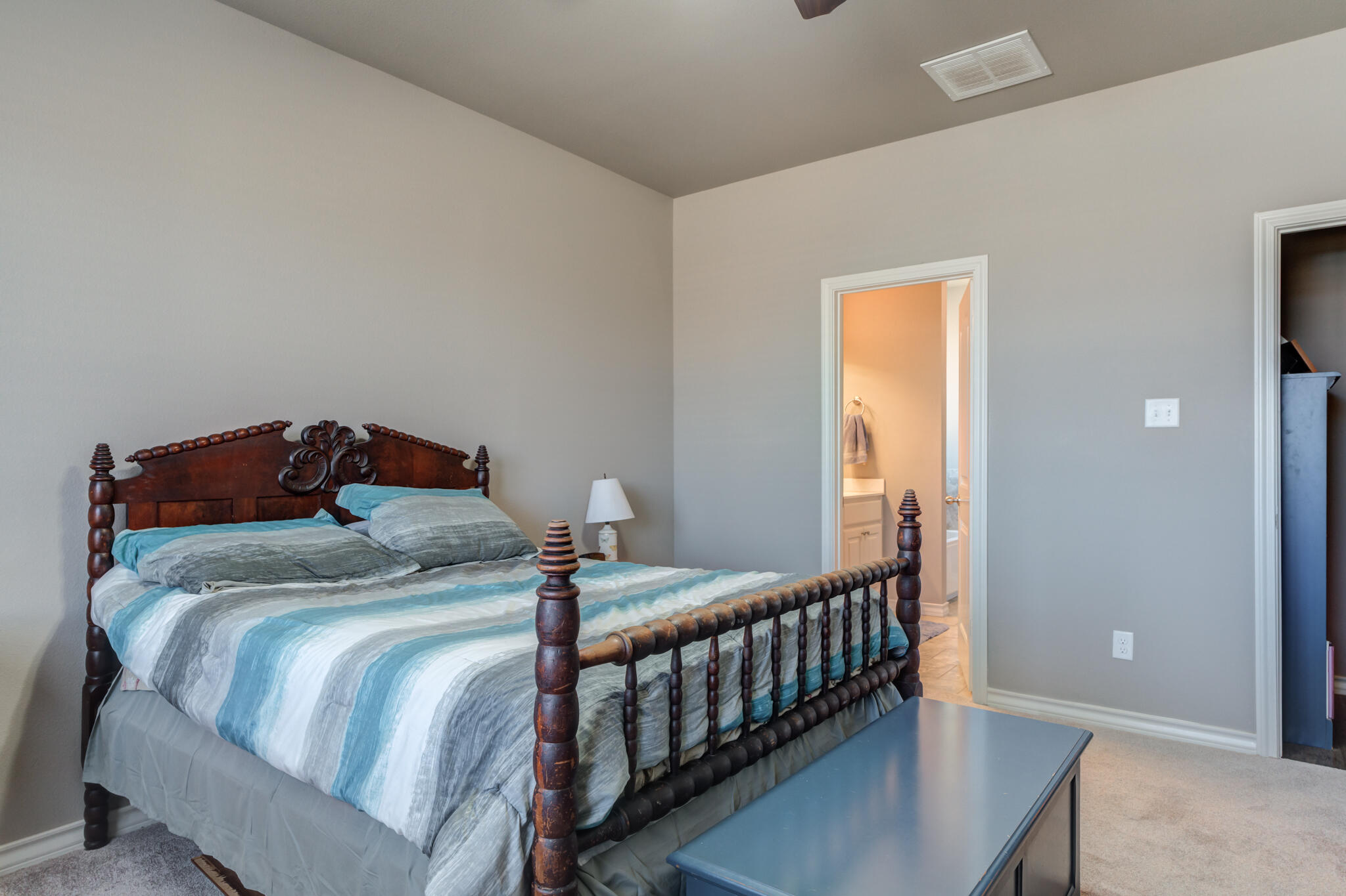 5219 Kemper Street Lubbock, TX 79416 - Photo 21 of 38 a bedroom with a bed and a window