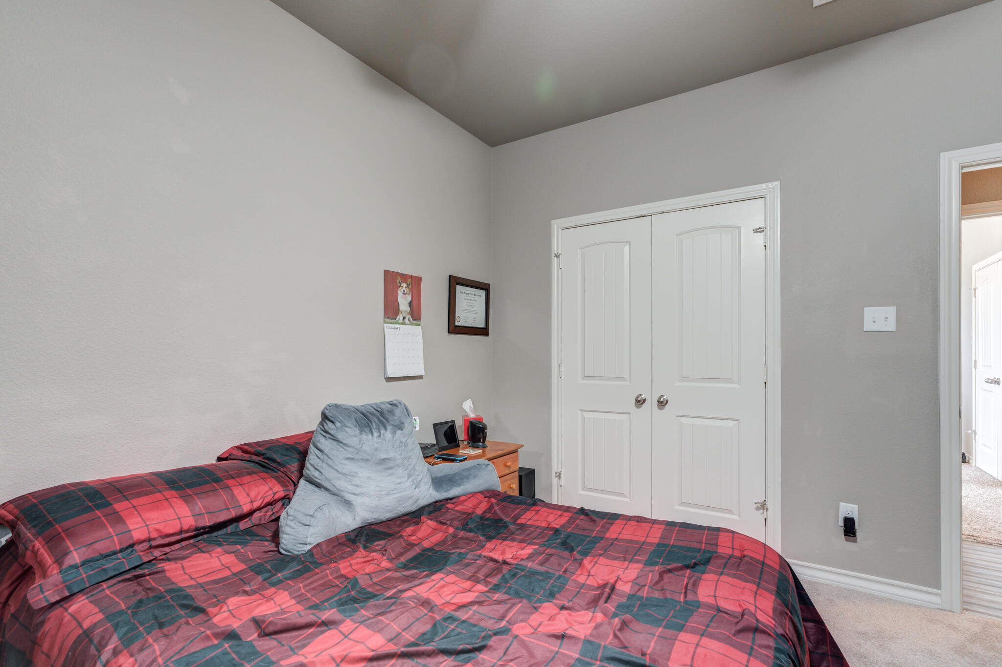 5219 Kemper Street Lubbock, TX 79416 - Photo 28 of 38 a bedroom with a bed and a window