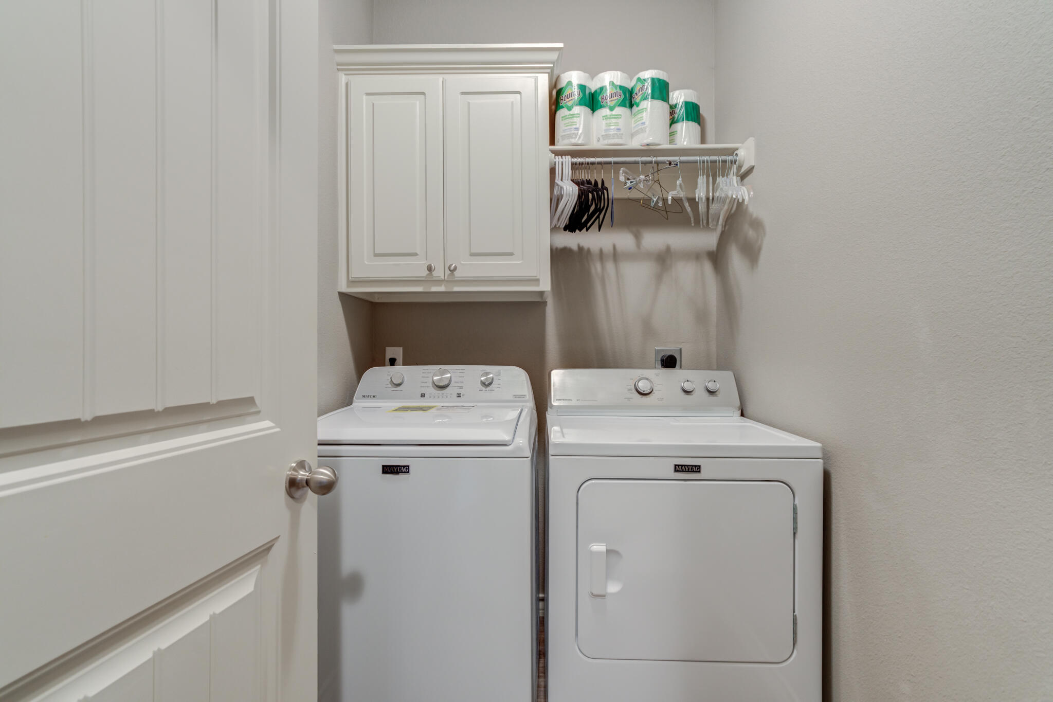 5219 Kemper Street Lubbock, TX 79416 - Photo 34 of 38 a utility room with dryer and washer