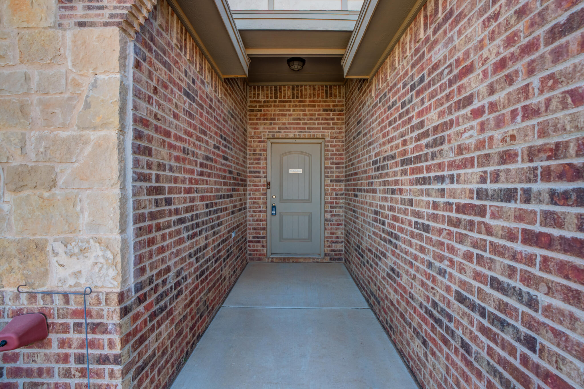 5219 Kemper Street Lubbock, TX 79416 - Photo 7 of 38 a view of wooden door