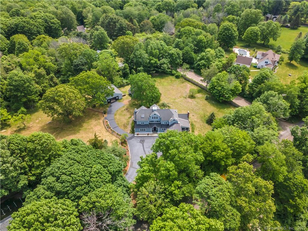 54 Chestnut Hill Road Killingworth, CT 06419 - Photo 1 of 1 Aerial photo of the home, barn and paddock - all found on the 3 acres of this private, manicured plot of land.