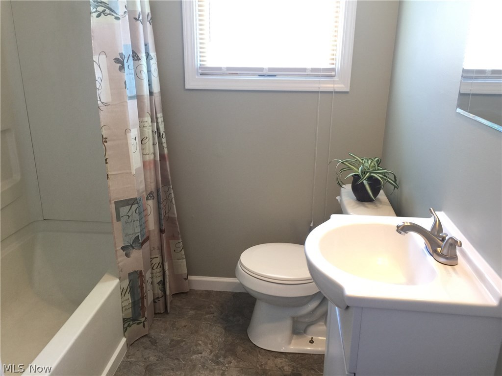1037 Portage Line Road Mogadore, OH 44260 - Photo 12 of 18 The main bath of the home is completely updated,