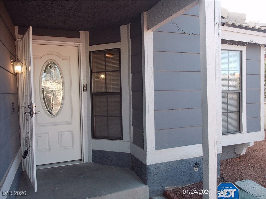 7313 Saybrook Point Drive Las Vegas, NV 89128 - Photo 3 of 31 Entrance to property featuring crawl space