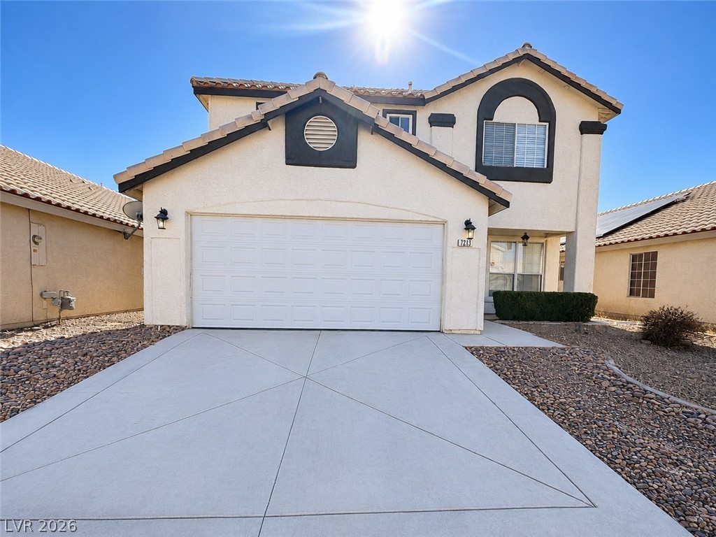 7213 London Bridge Avenue Las Vegas, NV 89130 - Photo 1 of 11 This appealing residence features a spacious driveway and a neatly maintained front exterior.