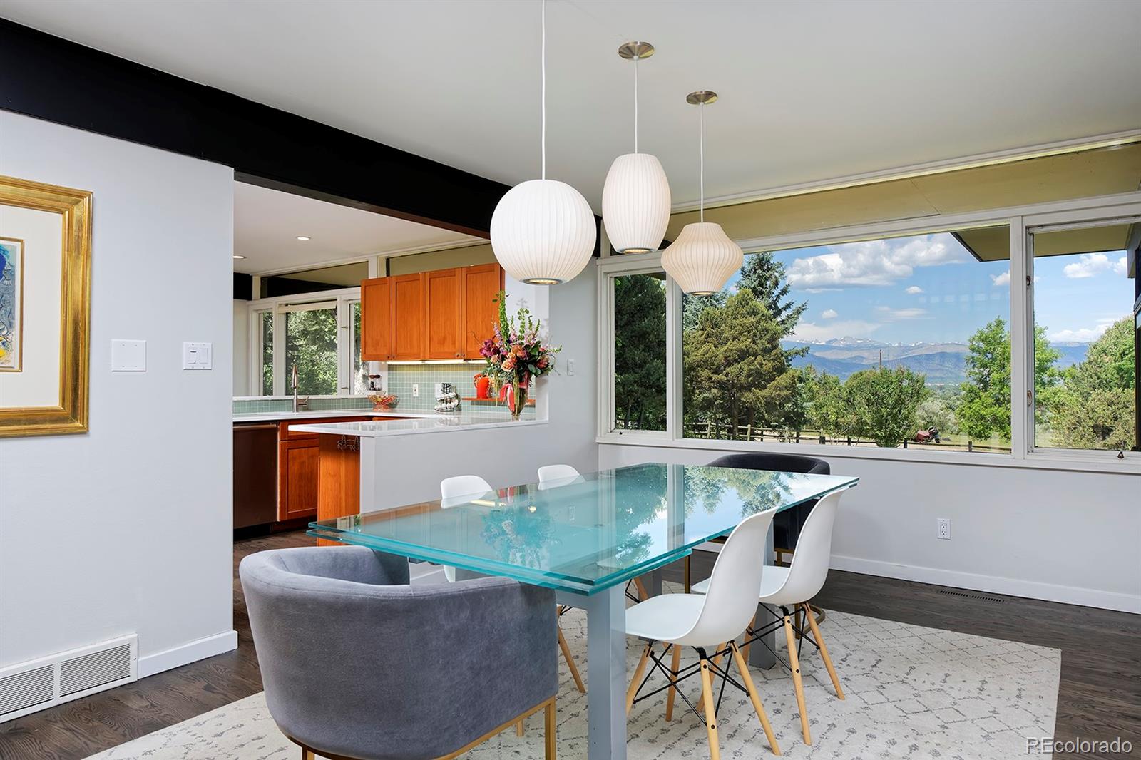 260 Ridge Road Boulder, CO 80303 - Photo 11 of 40 a dining room with furniture and a large window