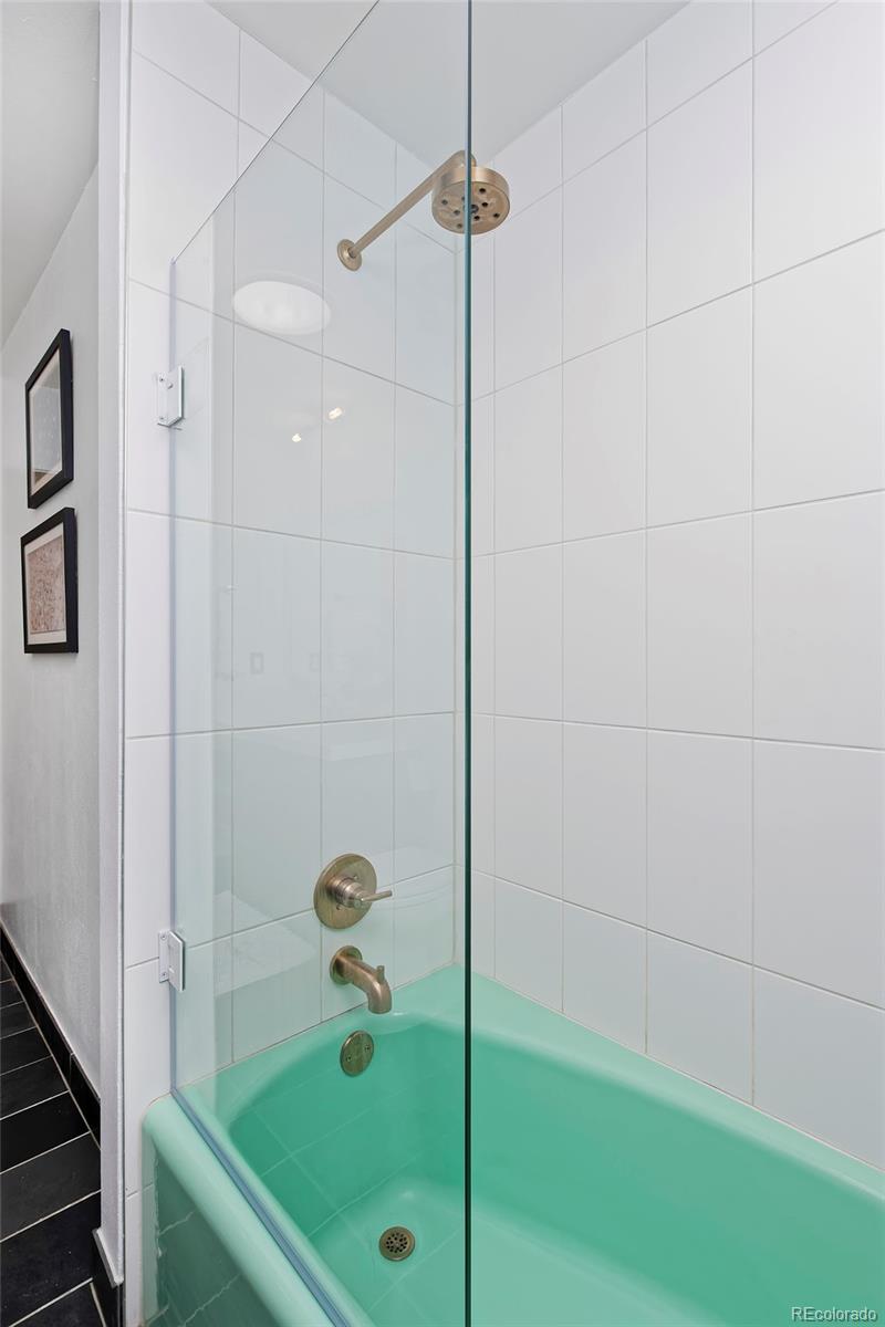 260 Ridge Road Boulder, CO 80303 - Photo 27 of 40 a bathroom with a tub and shower