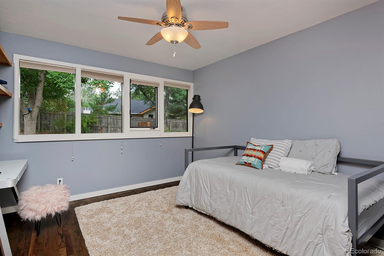 260 Ridge Road Boulder, CO 80303 - Photo 28 of 40 a bed sitting in a bedroom next to a window