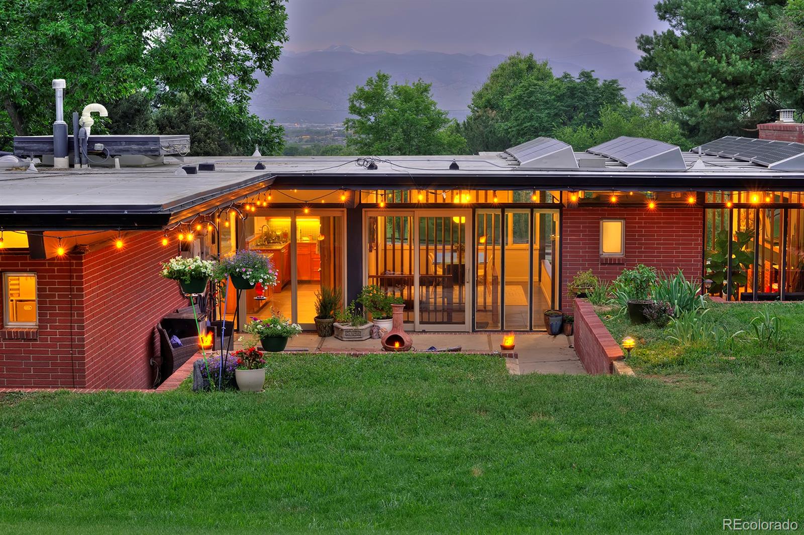 260 Ridge Road Boulder, CO 80303 - Photo 38 of 40 a view of a swimming pool with an outdoor seating and a yard