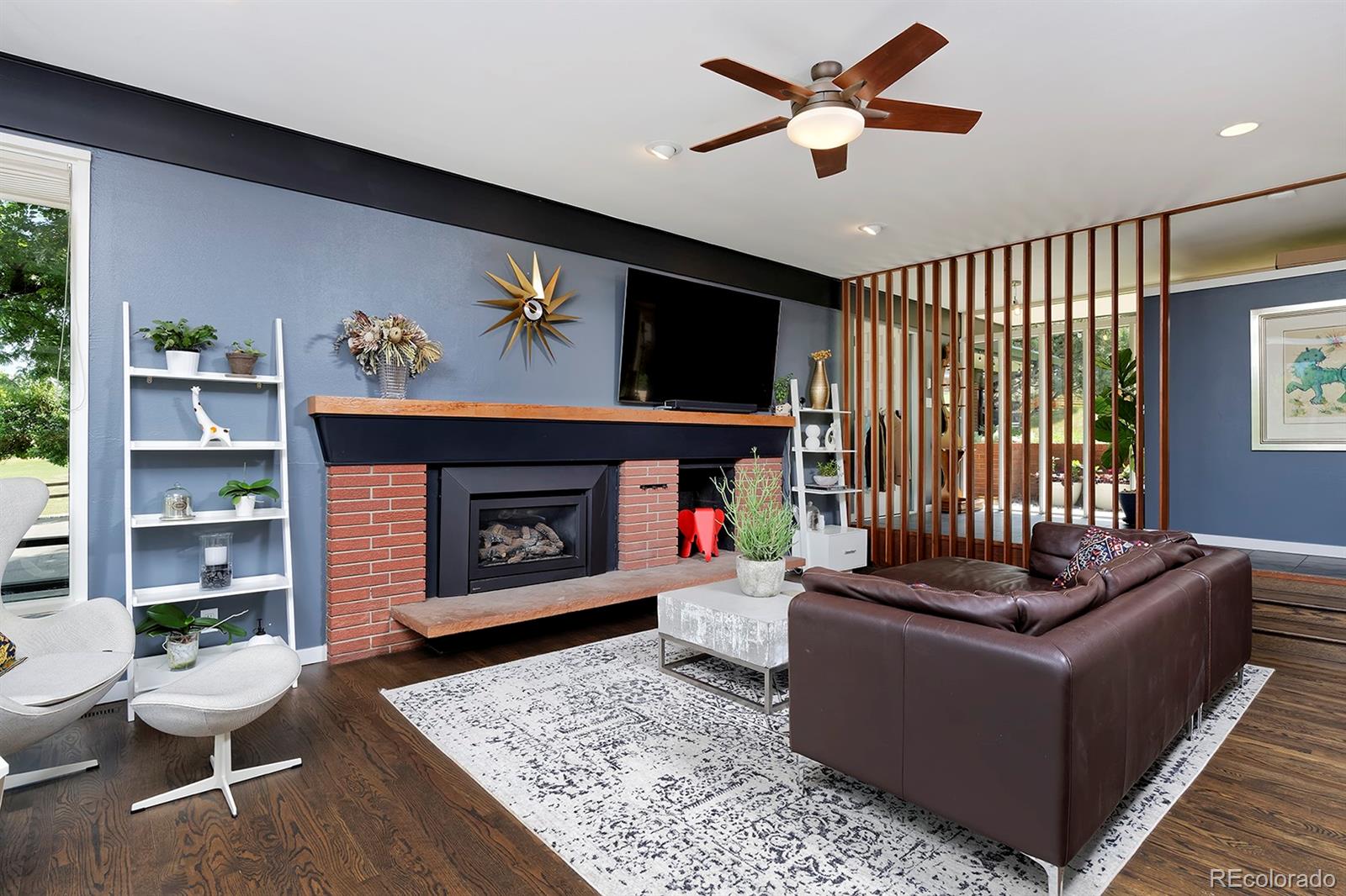 260 Ridge Road Boulder, CO 80303 - Photo 8 of 40 a living room with furniture and a fireplace