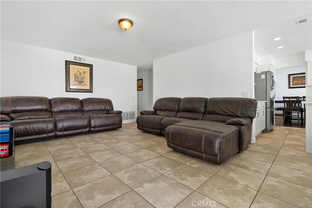 9321 Loquat Drive Riverside, CA 92508 - Photo 14 of 39 a living room with furniture