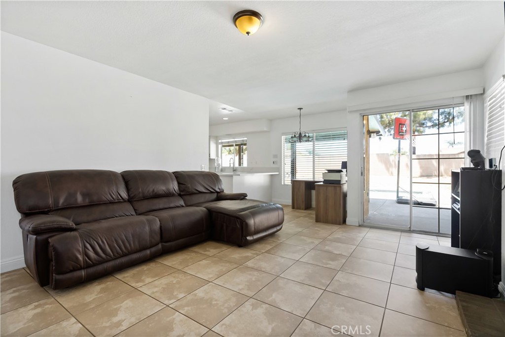 9321 Loquat Drive Riverside, CA 92508 - Photo 15 of 39 a living room with furniture and a window