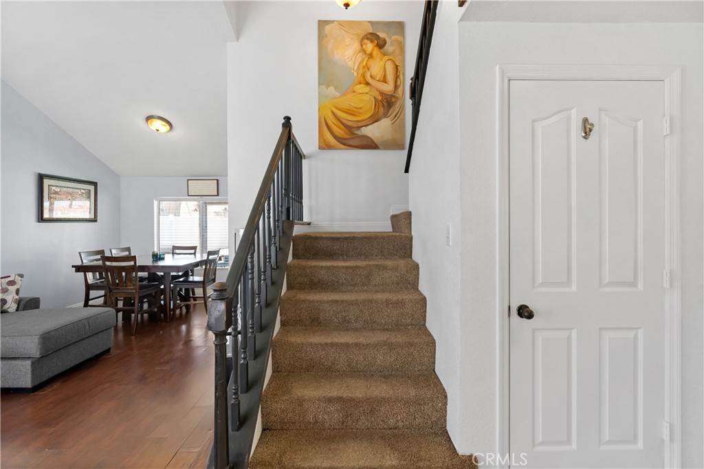 9321 Loquat Drive Riverside, CA 92508 - Photo 19 of 39 a view of entryway and hall with wooden floor