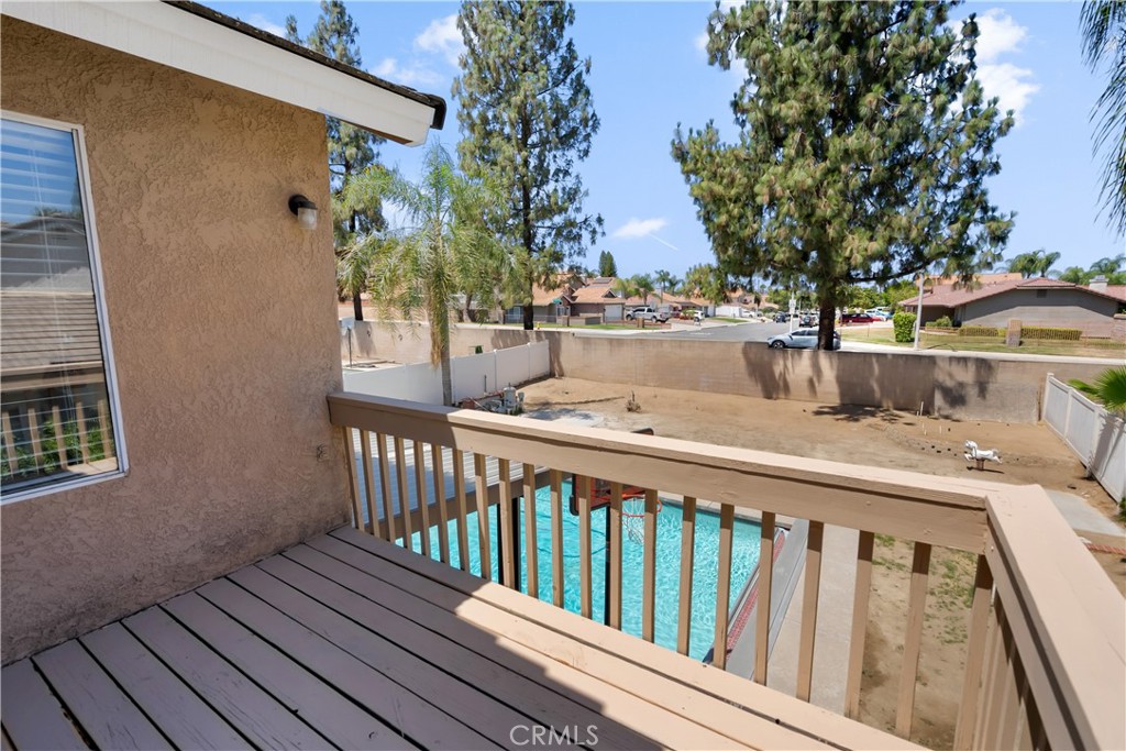 9321 Loquat Drive Riverside, CA 92508 - Photo 26 of 39 a view of a balcony with wooden floor