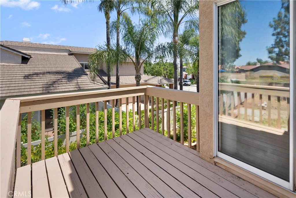9321 Loquat Drive Riverside, CA 92508 - Photo 27 of 39 a view of balcony with wooden floor