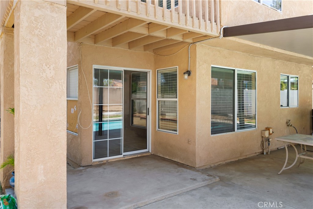 9321 Loquat Drive Riverside, CA 92508 - Photo 32 of 39 a view of house with backyard