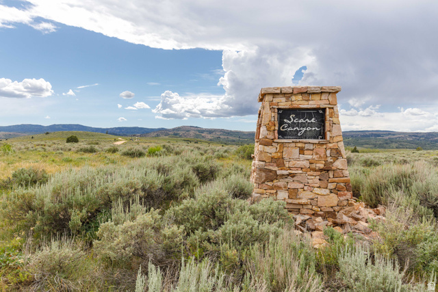 23 Scare Canyon, Unit 23 Logan, UT 84321 - Photo 3 of 33 Stone monument featuring a black plaque with white text