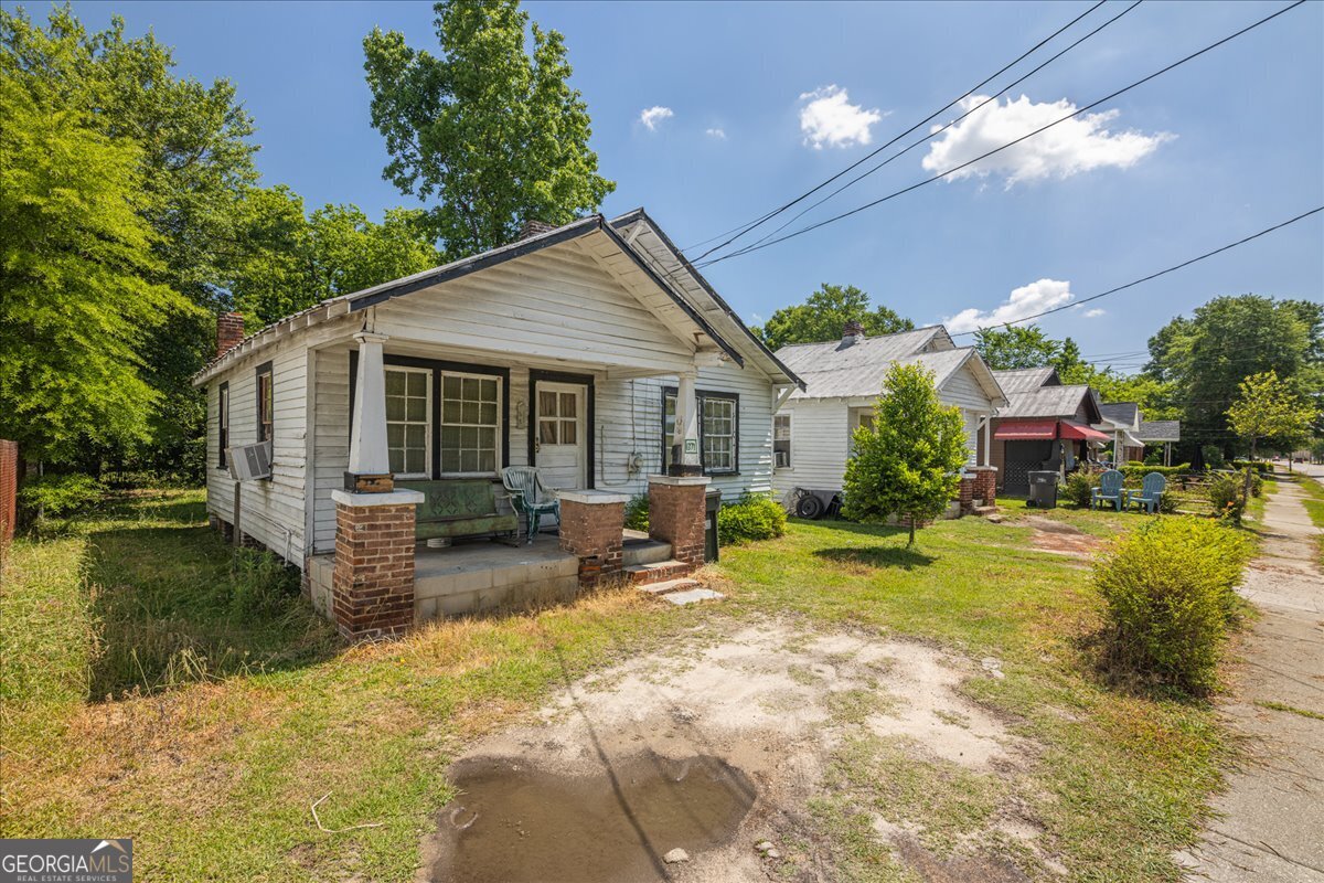 1367 Wrightsboro Road Augusta, GA 30901 - Photo 18 of 49 a view of a house with backyard and sitting area