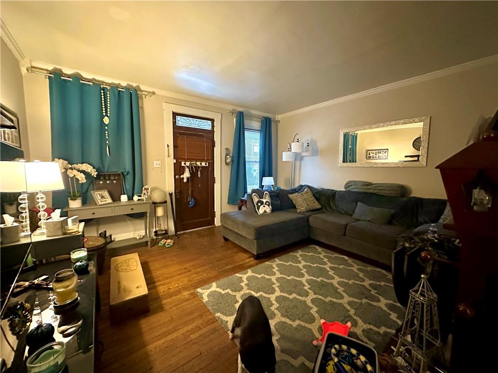 121 Monitor Avenue Pittsburgh, PA 15202 - Photo 2 of 13 Entry/Living Room with hardwood floors and fireplace.