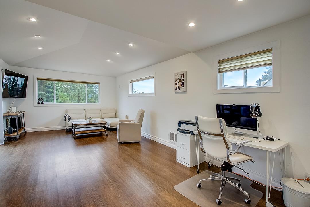 776 Lockhaven Drive Pacifica, CA 94044 - Photo 15 of 49 a living room with furniture and a wooden floor