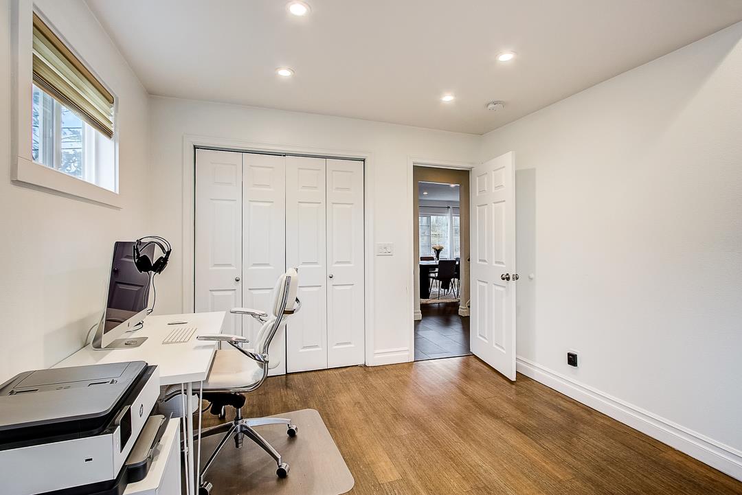 776 Lockhaven Drive Pacifica, CA 94044 - Photo 16 of 49 a view of a workspace with furniture and wooden floor