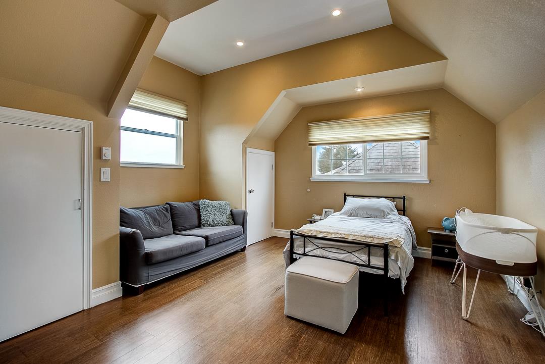 776 Lockhaven Drive Pacifica, CA 94044 - Photo 30 of 49 a living room with furniture and a wooden floor