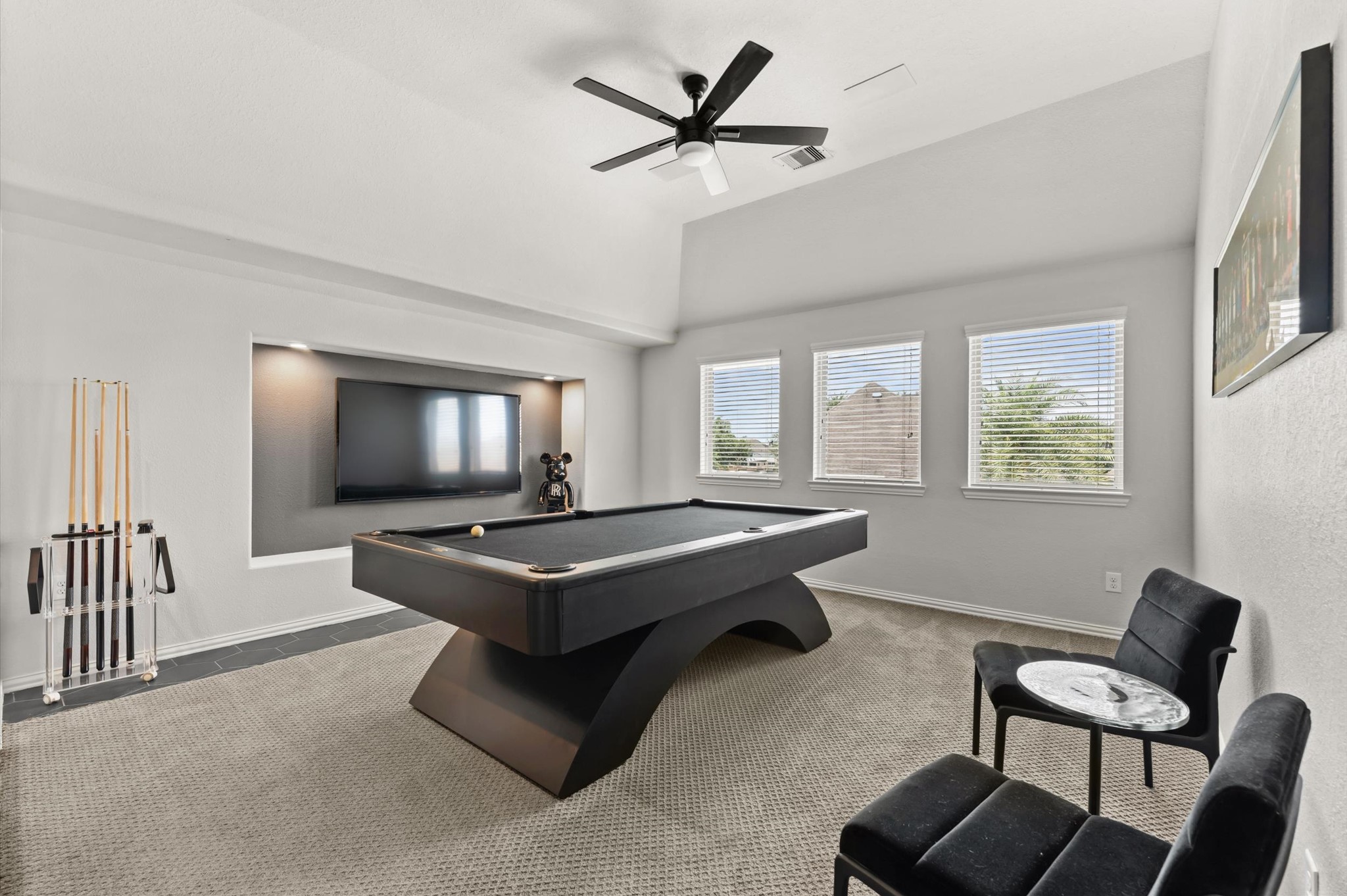 14016 Savannah Landing Lane Rosharon, TX 77583 - Photo 28 of 49 a living room with furniture a flat screen tv and a window
