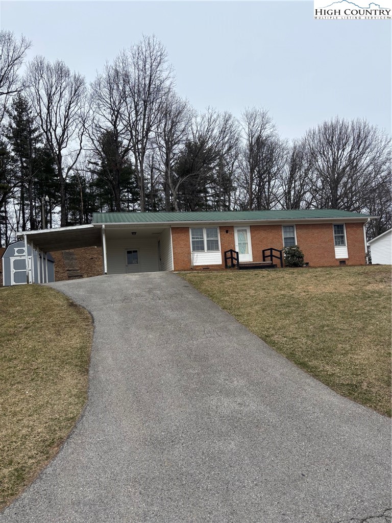 88 Grandridge Road Sparta, NC 28675 - Photo 1 of 21 a view of a house with a outdoor space