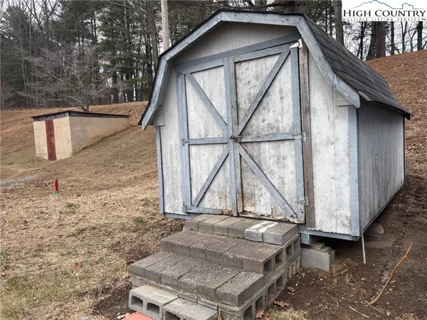 a house with trees in front of it