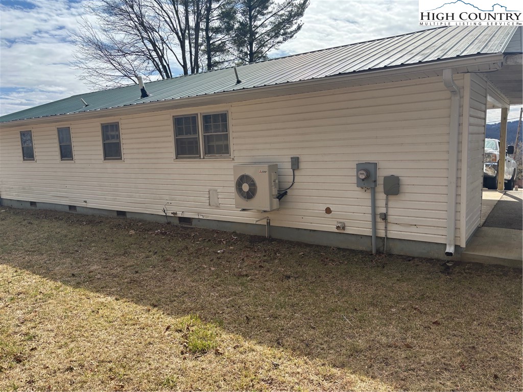 88 Grandridge Road Sparta, NC 28675 - Photo 17 of 21 a view of a house with backyard
