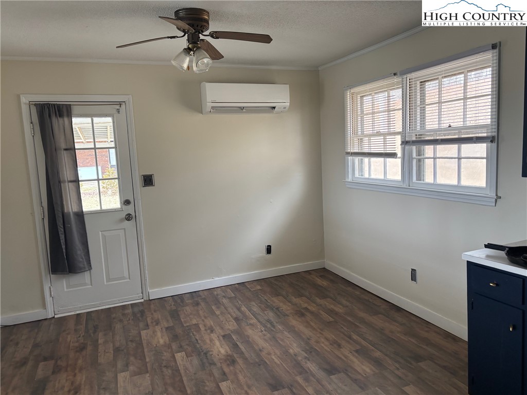 88 Grandridge Road Sparta, NC 28675 - Photo 3 of 21 wooden floor in an empty room with a window