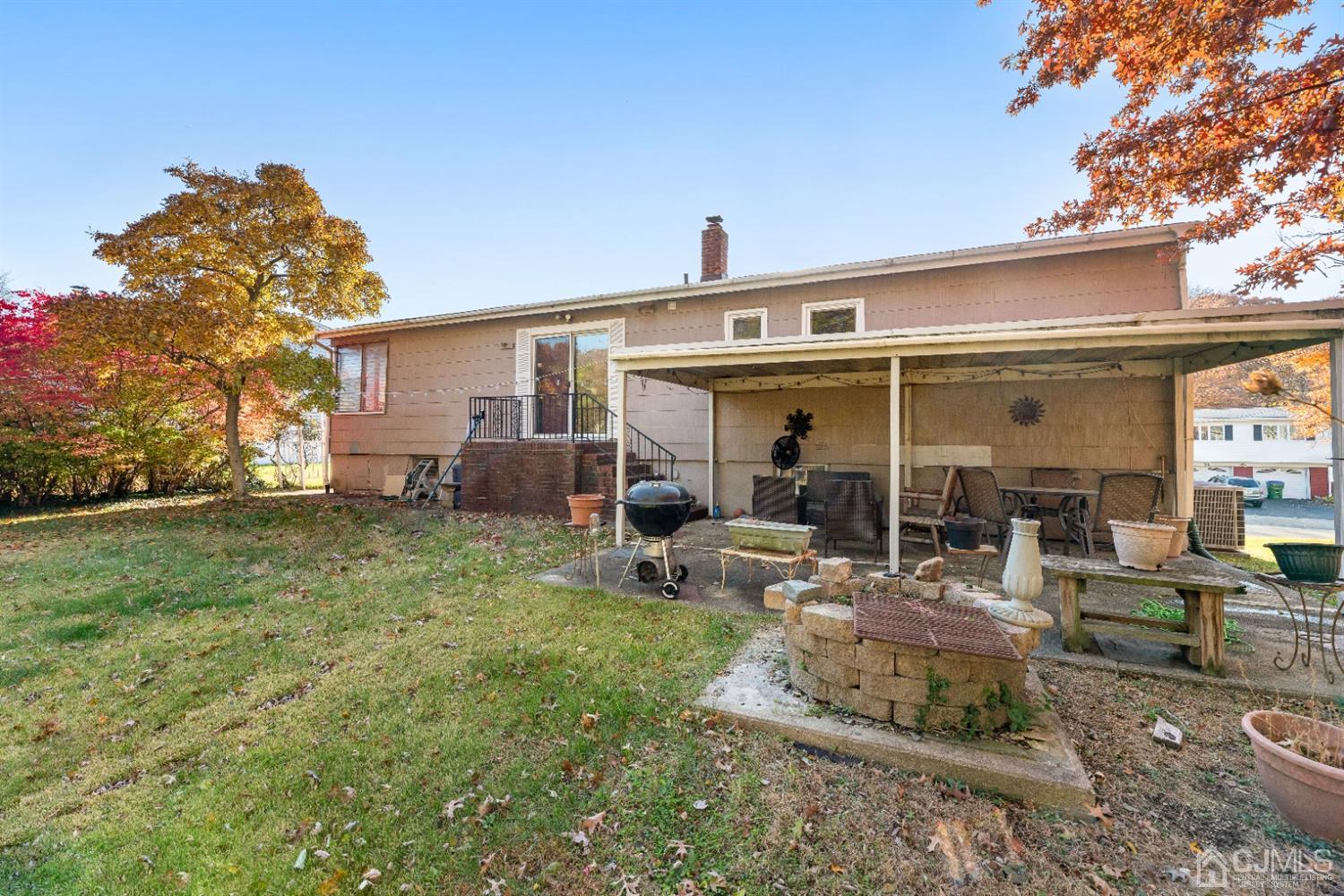 50 Wilk Road Edison, NJ 08837 - Photo 2 of 27 a view of a house with backyard