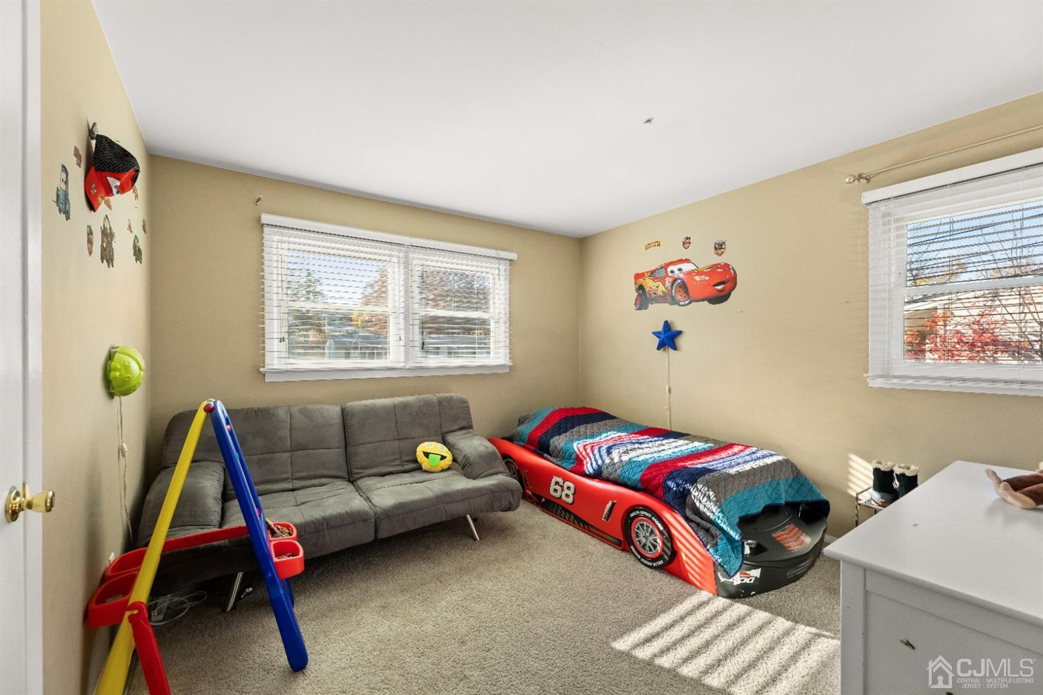 50 Wilk Road Edison, NJ 08837 - Photo 12 of 27 a bedroom with a bed and a couch