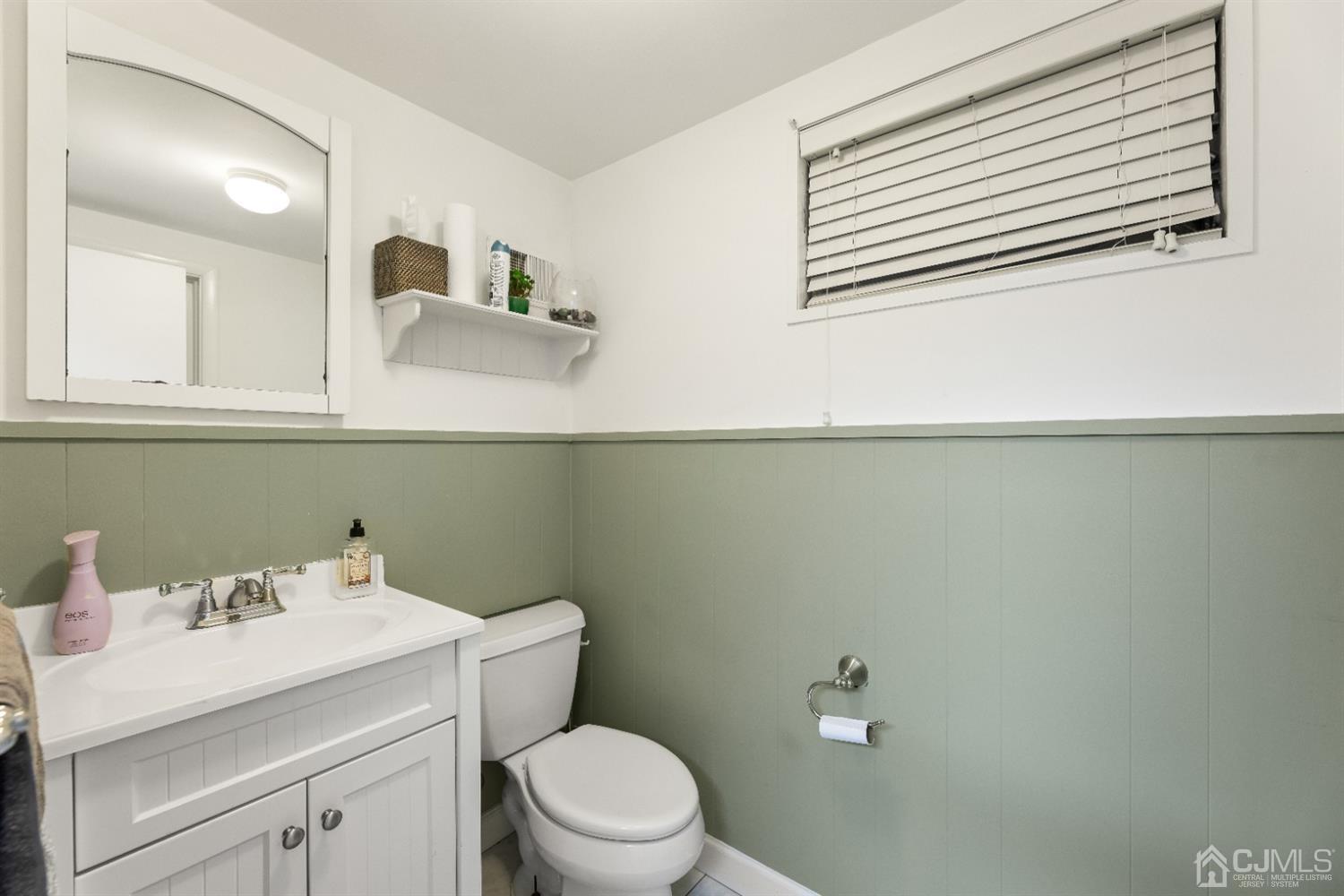 50 Wilk Road Edison, NJ 08837 - Photo 15 of 27 a bathroom with a sink and a toilet