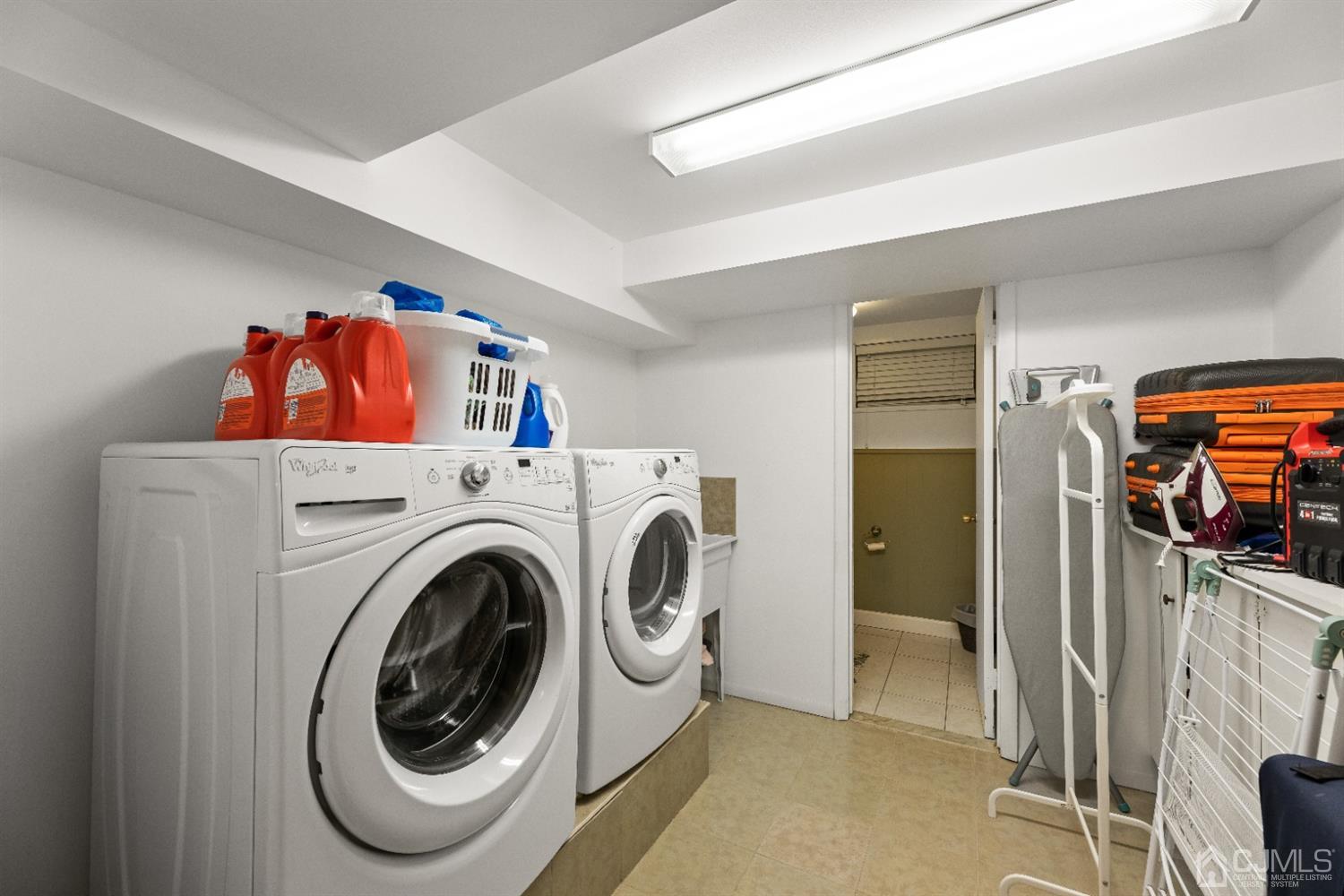 50 Wilk Road Edison, NJ 08837 - Photo 18 of 27 a utility room with dryer and washer