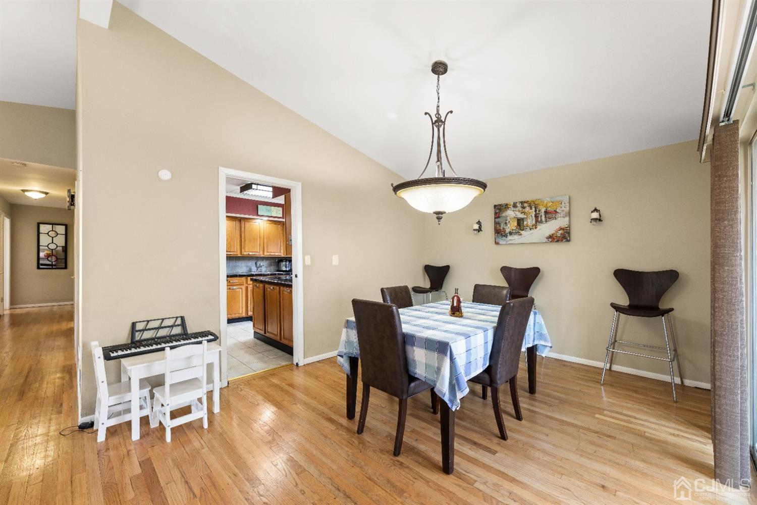 50 Wilk Road Edison, NJ 08837 - Photo 10 of 27 a view of a dining room with furniture and wooden floor