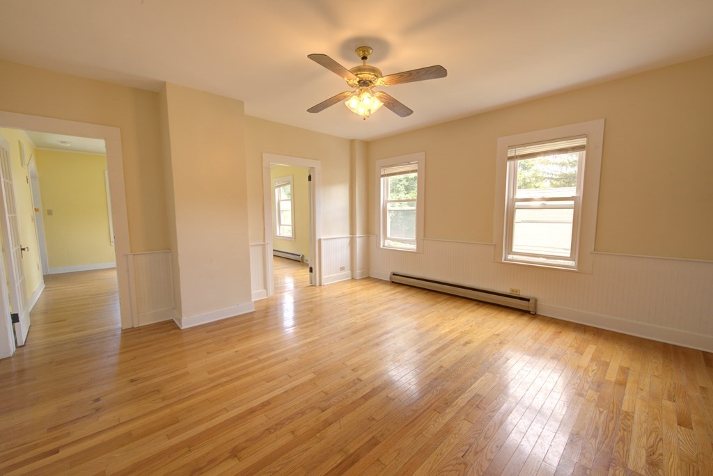 14 Pine Road Williamsburg, MA 01096 - Photo 7 of 42 a view of an empty room with wooden floor and a window