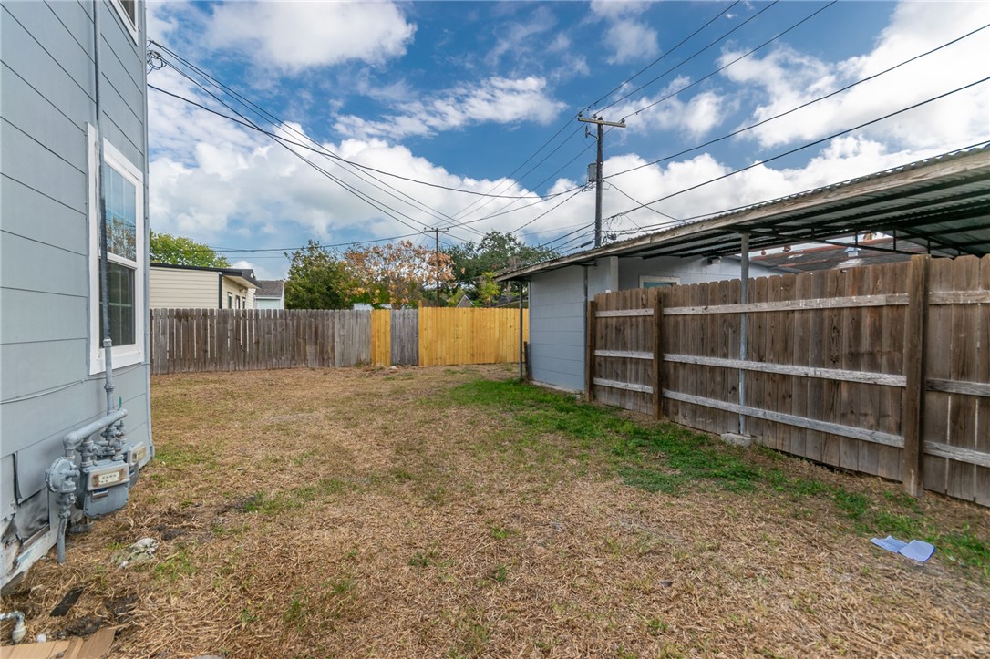 341 Sunset Avenue, Unit B Corpus Christi, TX 78404 - Photo 8 of 8 a view of backyard with green space
