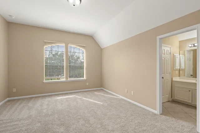 a big room with windows and closet