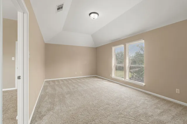 an empty room with windows