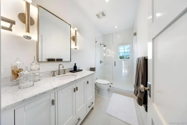 $945,000 | 68 Foster Avenue, Unit 13, Hampton Bays, NY 11946