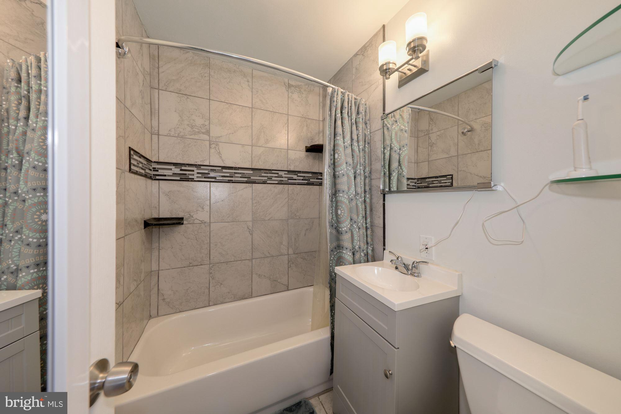 11510 Goodloe Road Silver Spring, MD 20906 - Photo 15 of 27 Main Level Bathroom.