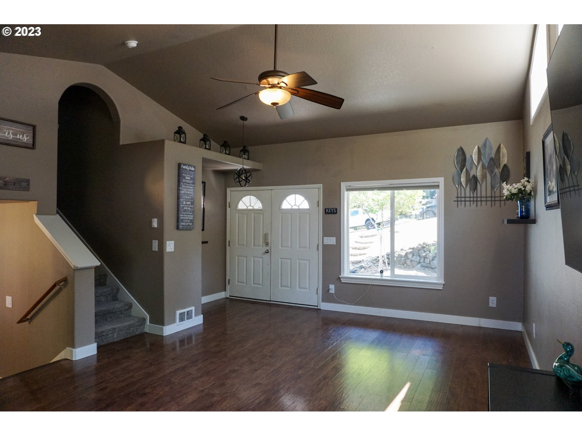828 South 73rd Street Springfield, OR 97478 - Photo 11 of 23 a view of an empty room with wooden floor and a window
