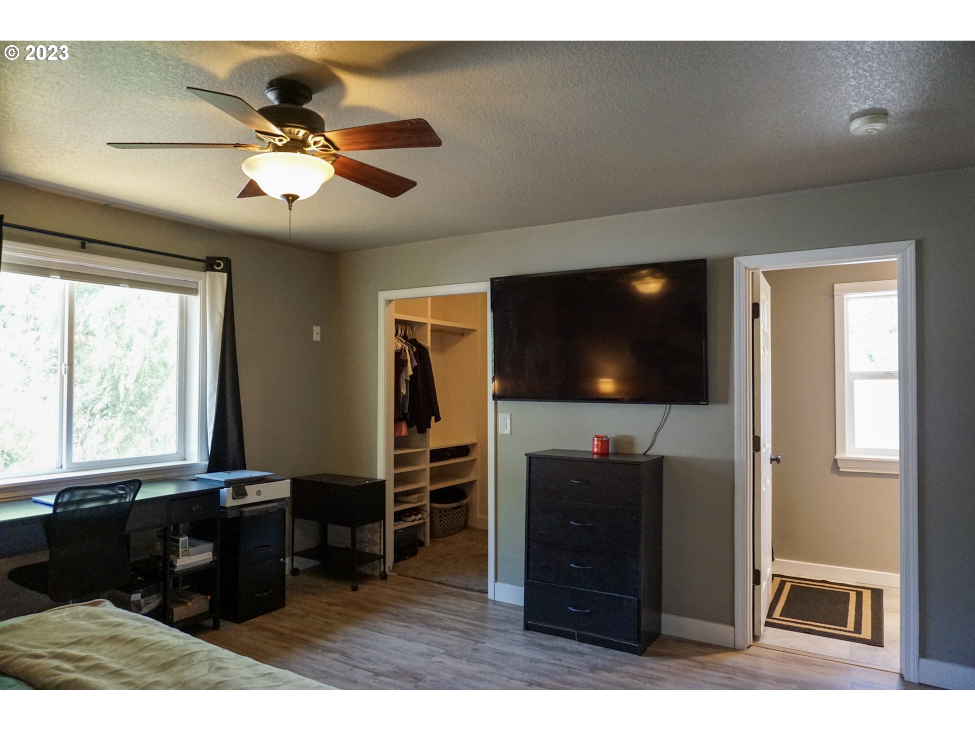 828 South 73rd Street Springfield, OR 97478 - Photo 14 of 23 a living room with furniture and a flat screen tv